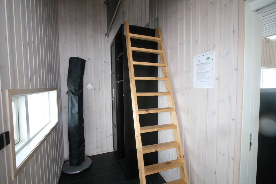 Entrance hall and the stairs to the loft bedroom