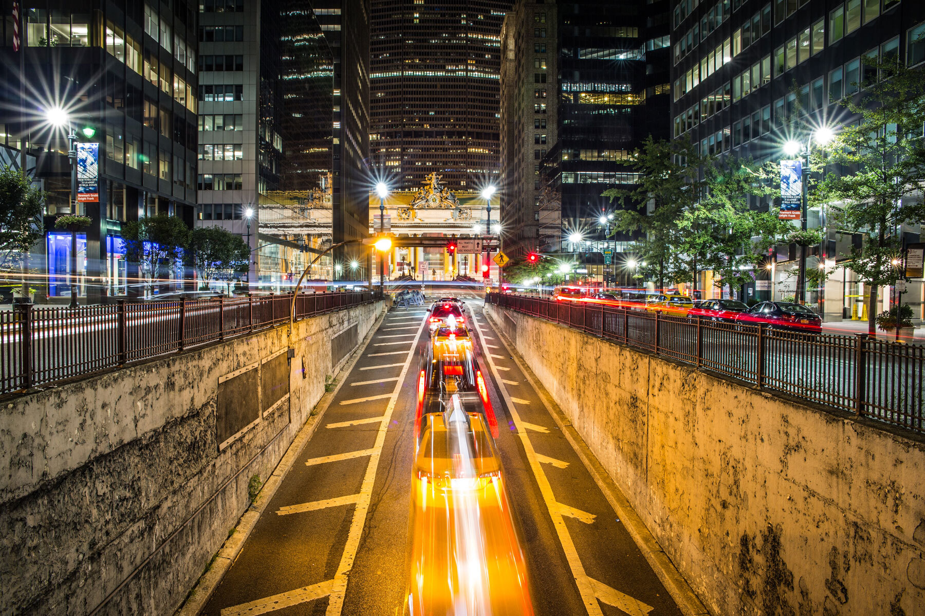 timelapse of cars coming out of tunnel at night in NYC