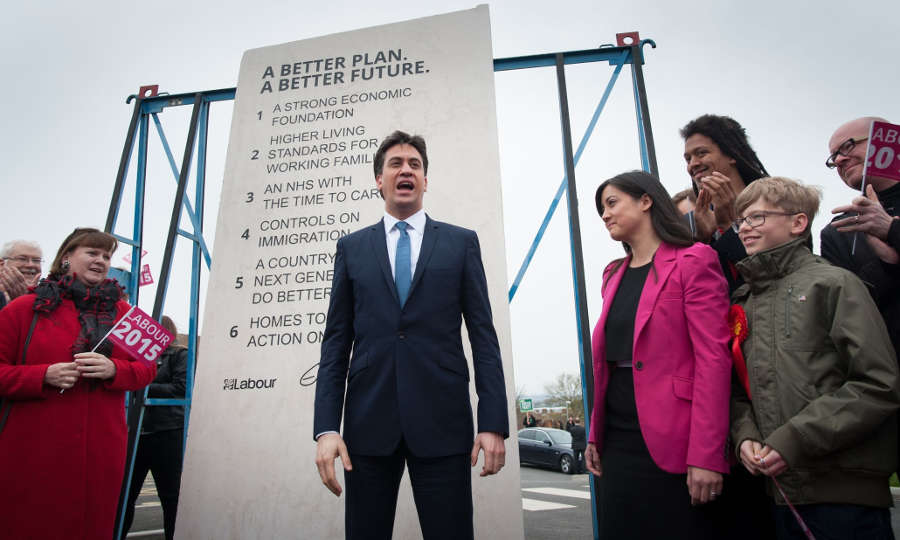 Ed Miliband stands in front of an 8 foot 6 stone
