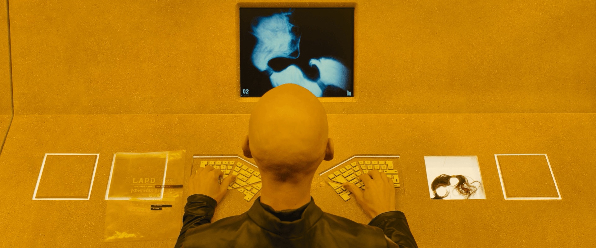 Blade Runner 2049 archivist using a split keyboard