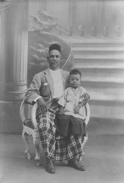 Jawi Peranakan man and child, 1910s–1930s