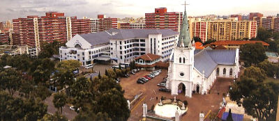An aerial view of the Church of the Nativity of the Blessed Virgin Mary. Blocks of HDB flats can be seen in the background.