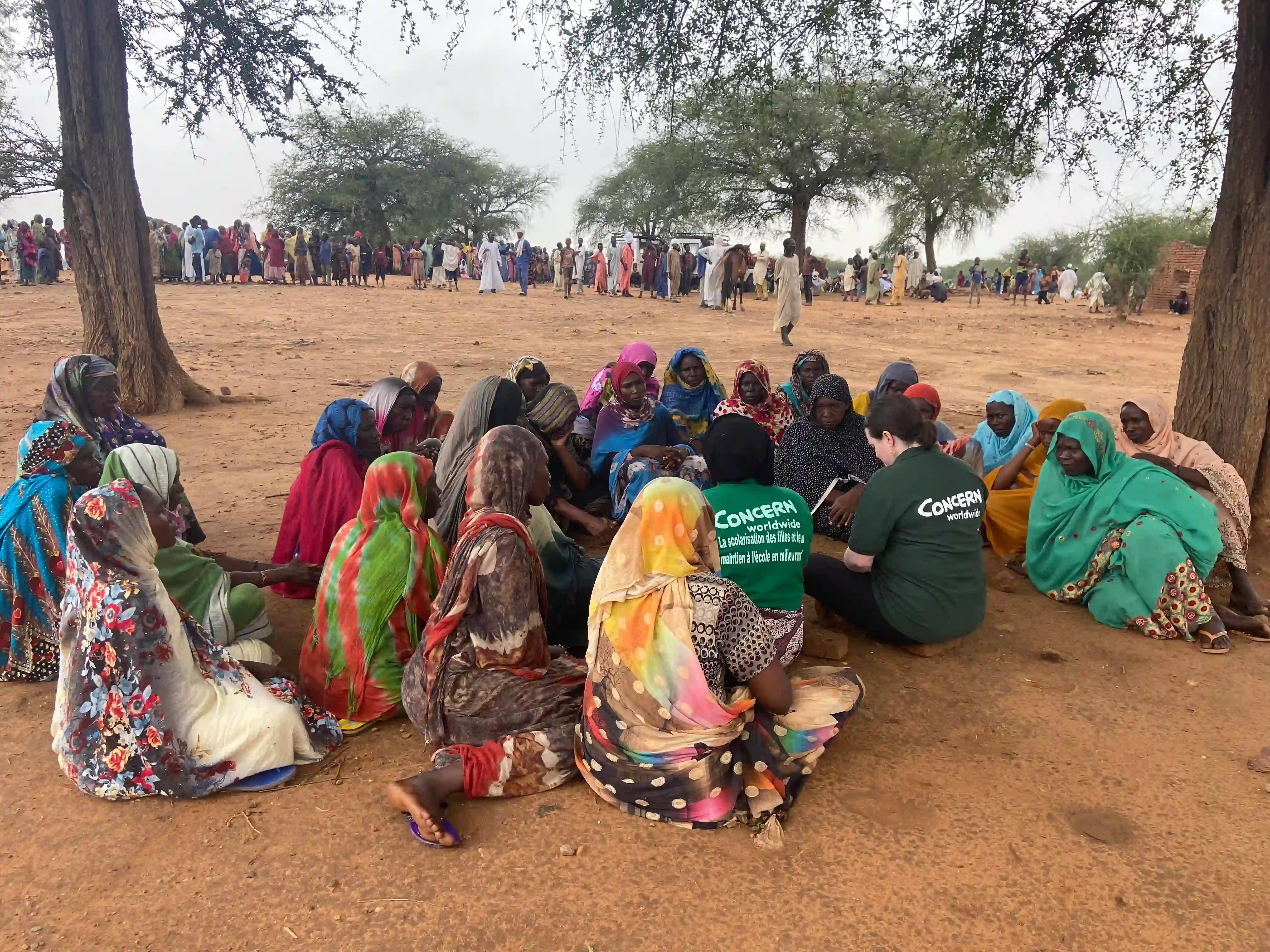Reka Sztopa Regional Director for West Africa & Sahel Region for Concern Worldwide speaks with refugees at a Chad refugee camp