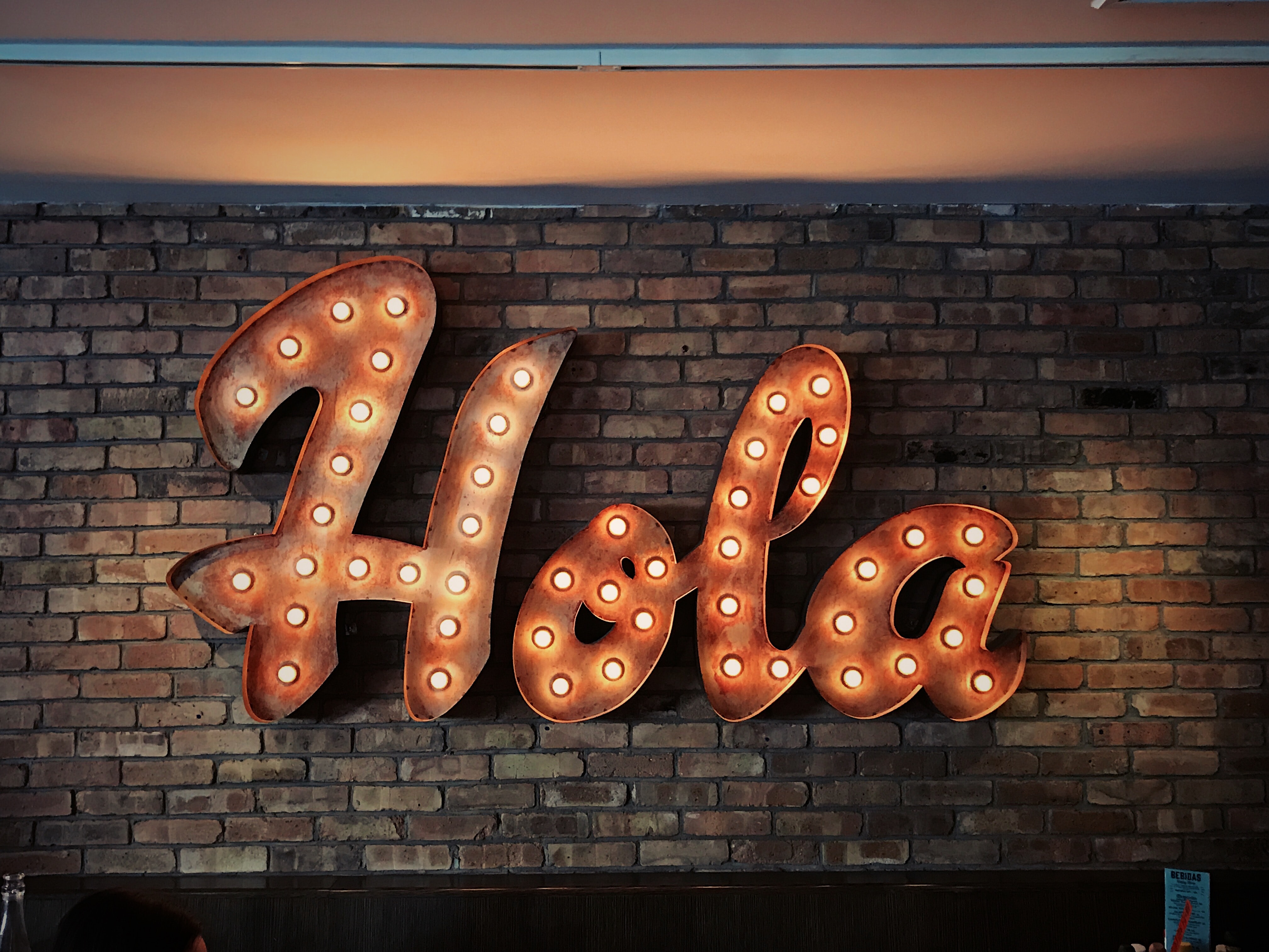 Sign saying hola