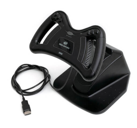 A photo of an official Sega Saturn steering wheel accessory.