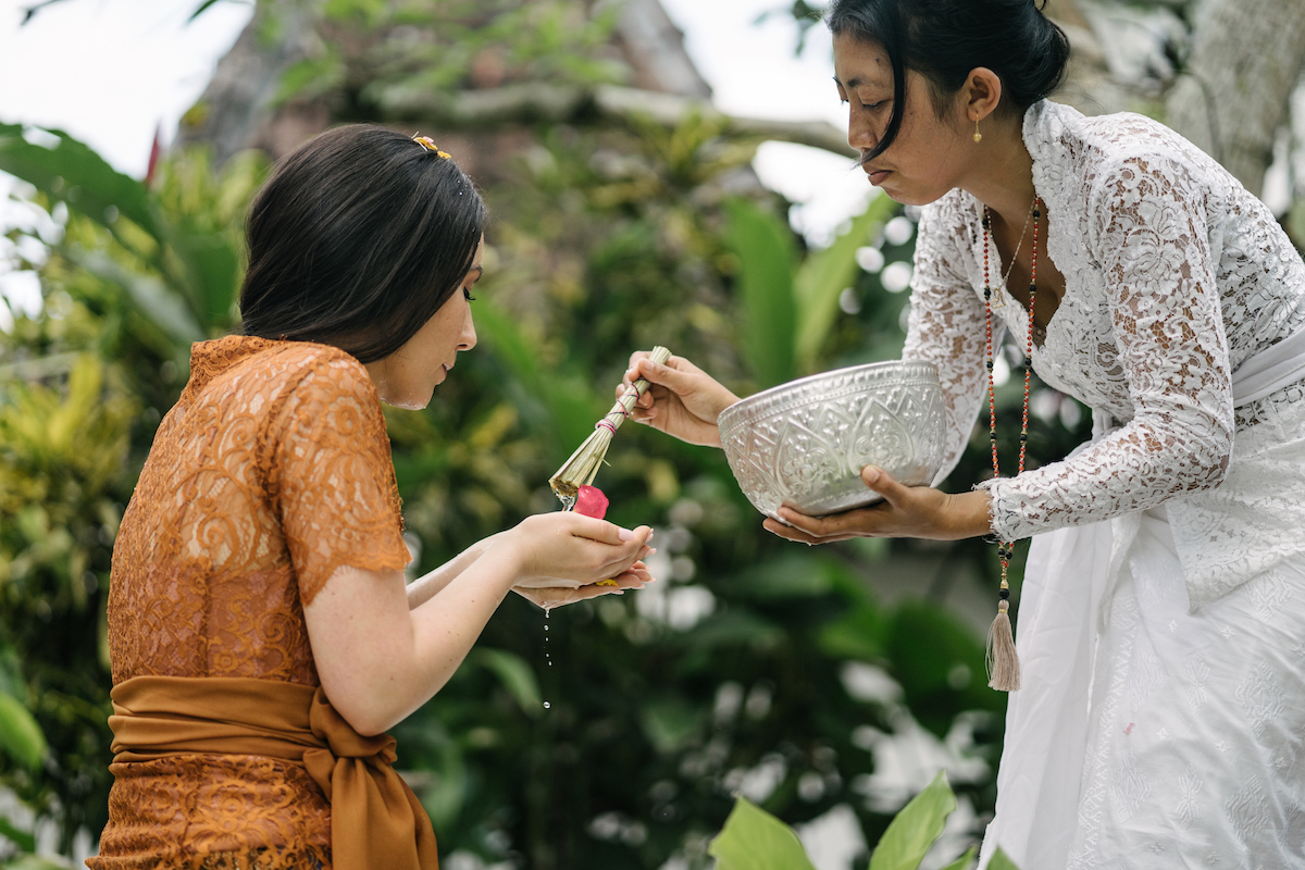 Water blessing and karma cleansing with Tya priestess in Bali