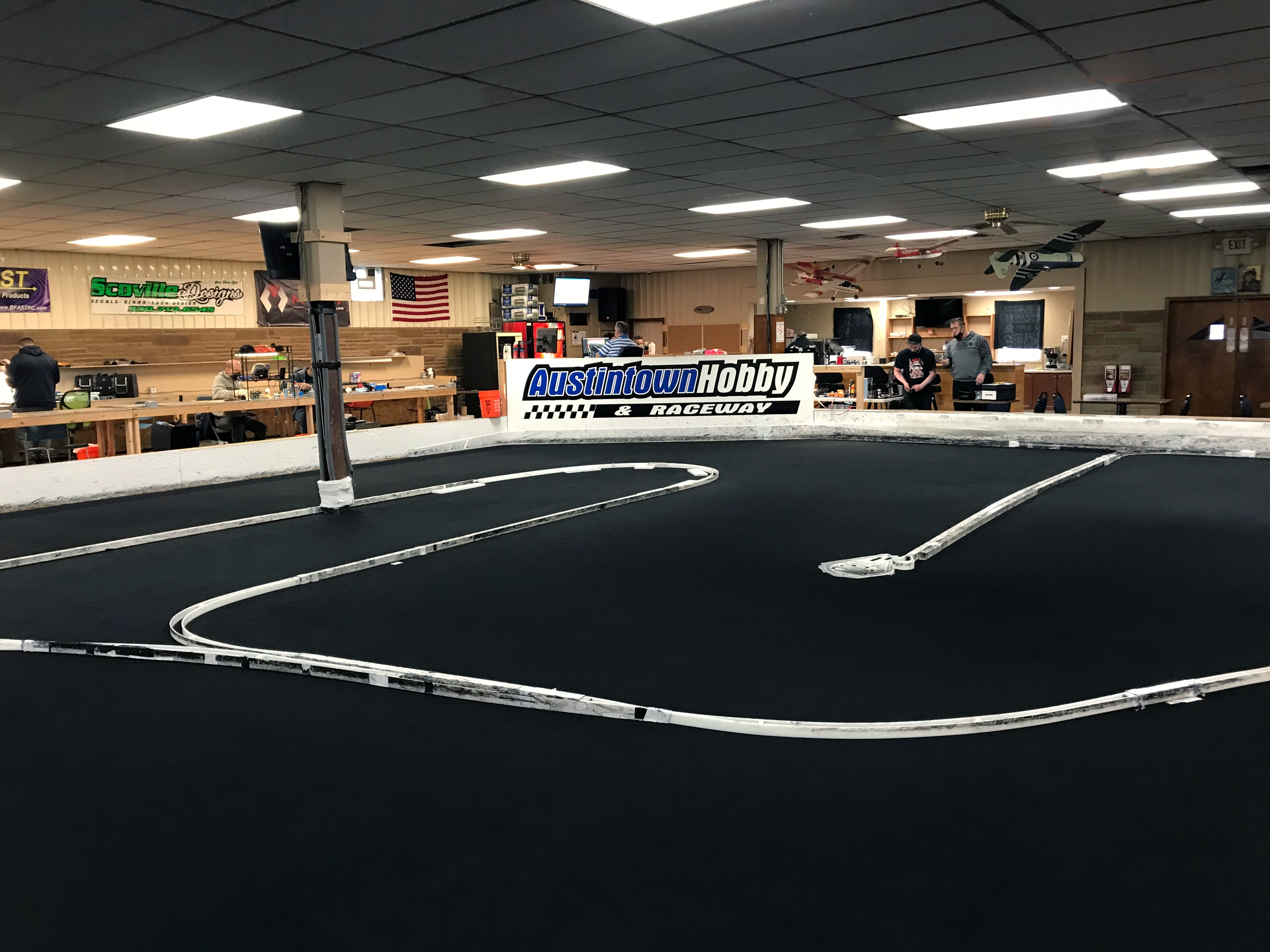 A trackside view of Austintown Hobby & Raceways indoor carpet track.