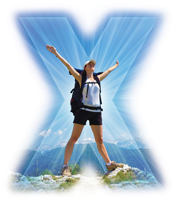 Woman hiker creating X with her arms and legs