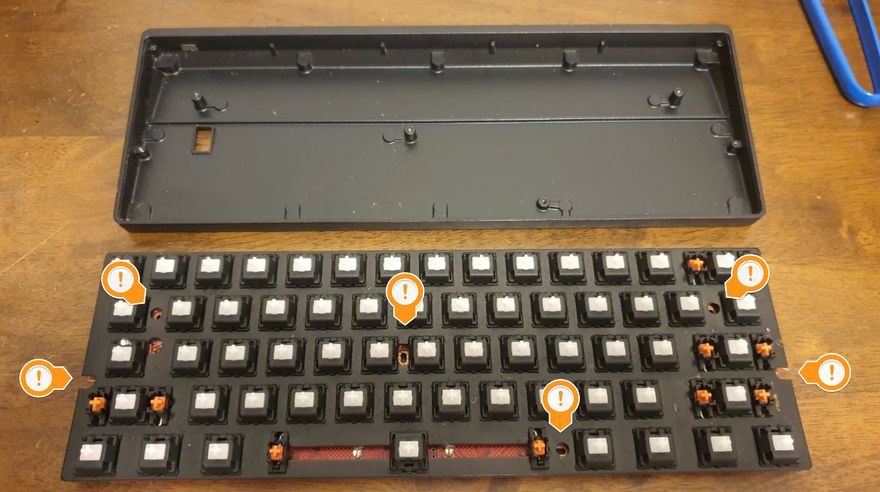 The locations of the screws on the Pok3r.