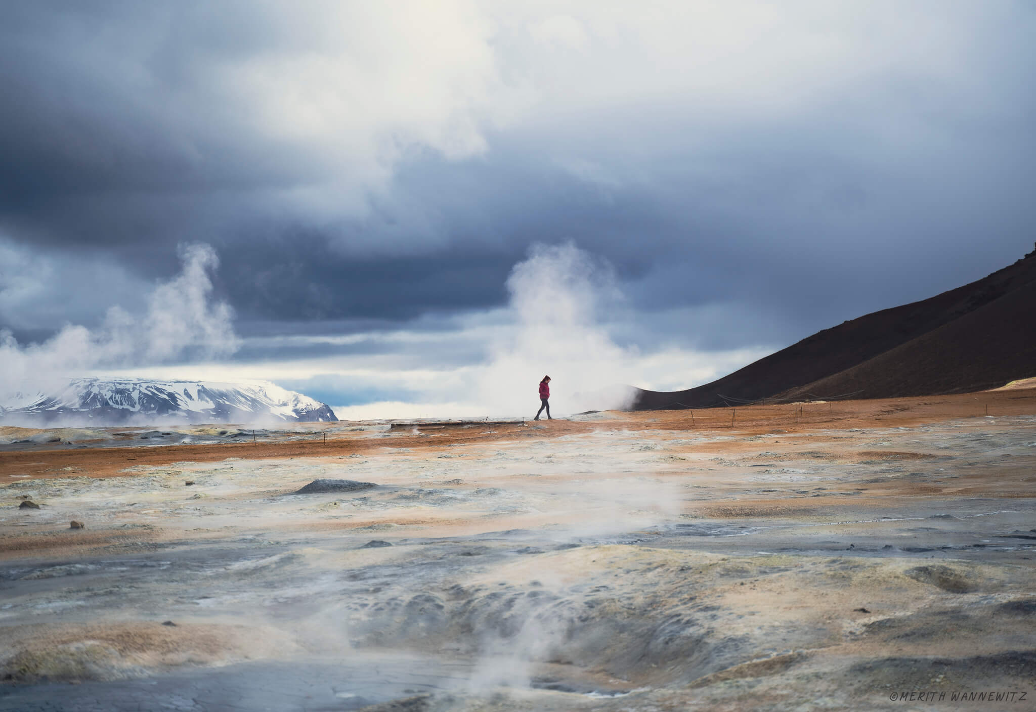 A woman in the geothermal area of Iceland.