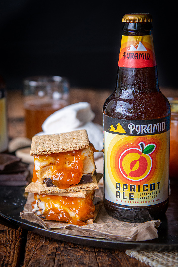 Apricot ale smores and it's ingredients next to a bottle of Pyramid Apricot Ale