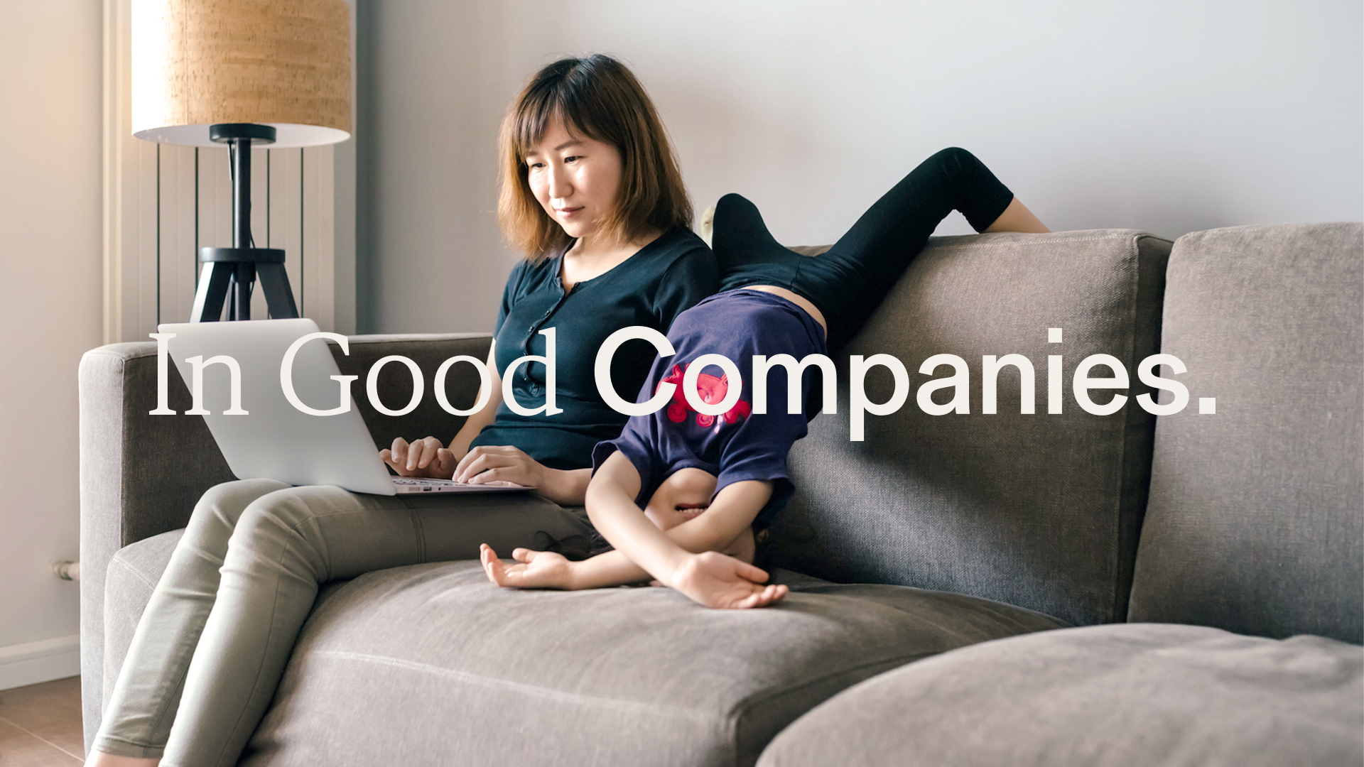 p﻿hoto of mom and child with tagline “In Good Companies.” on top