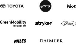 Group of black and white logos of mobility companies, including Toyota, IVECO, stryker, Green Mobility and hive.