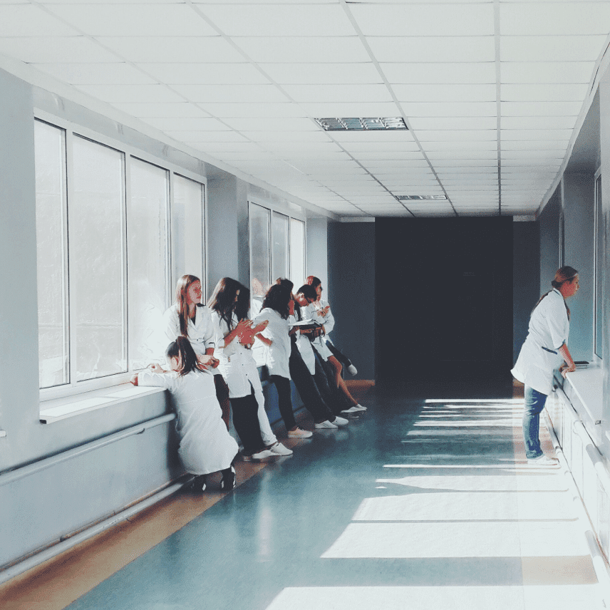 Doctors in a hallway at Praesum Healthcare