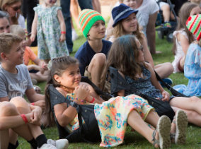 Lingfest 2019 children sitting and watching the elves and shomaker story being told ©Brett Butler