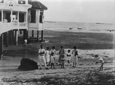 A family at a beach house, 1920s
