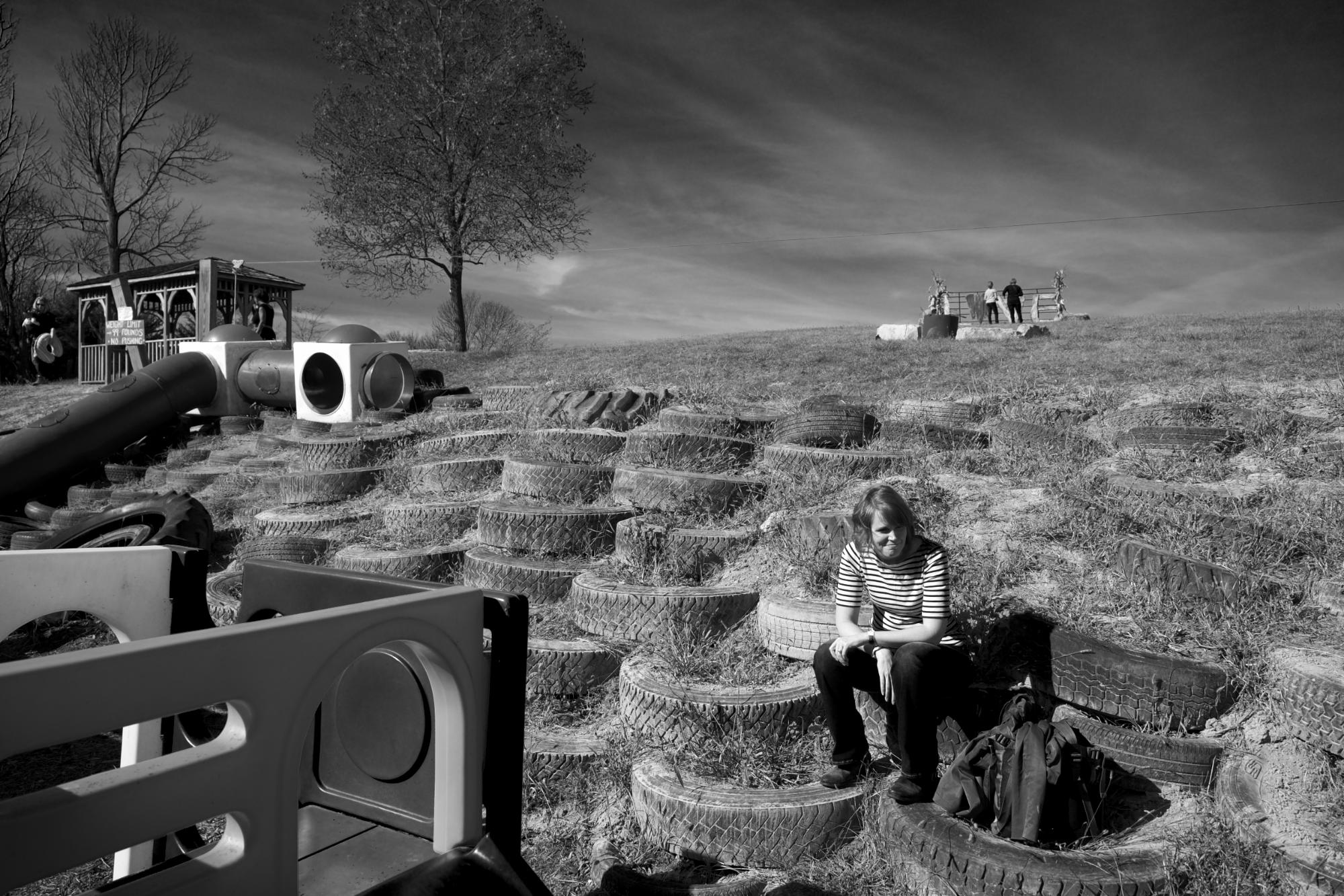 <p>My wife, Jackie, chilling on a pile of old tires.</p>\n