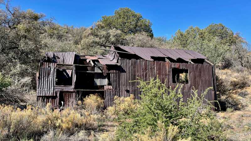 A rusted old building at a mine site