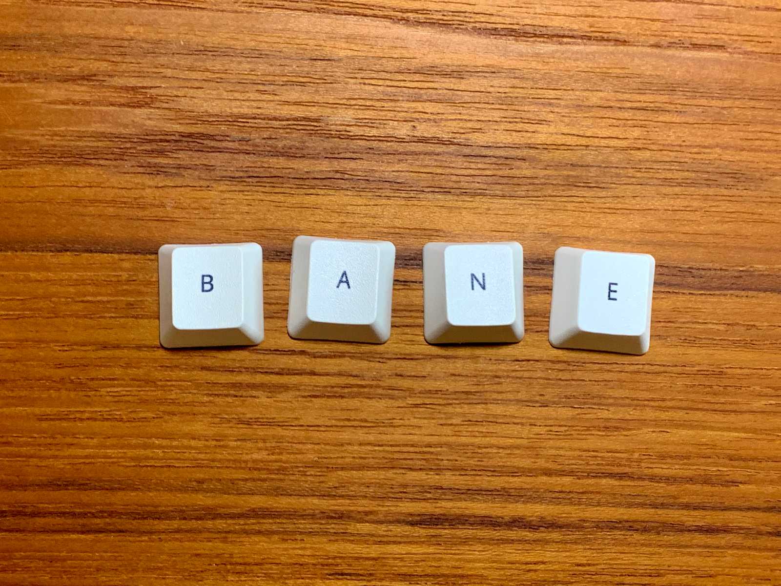 Keycaps spelling "Bane"