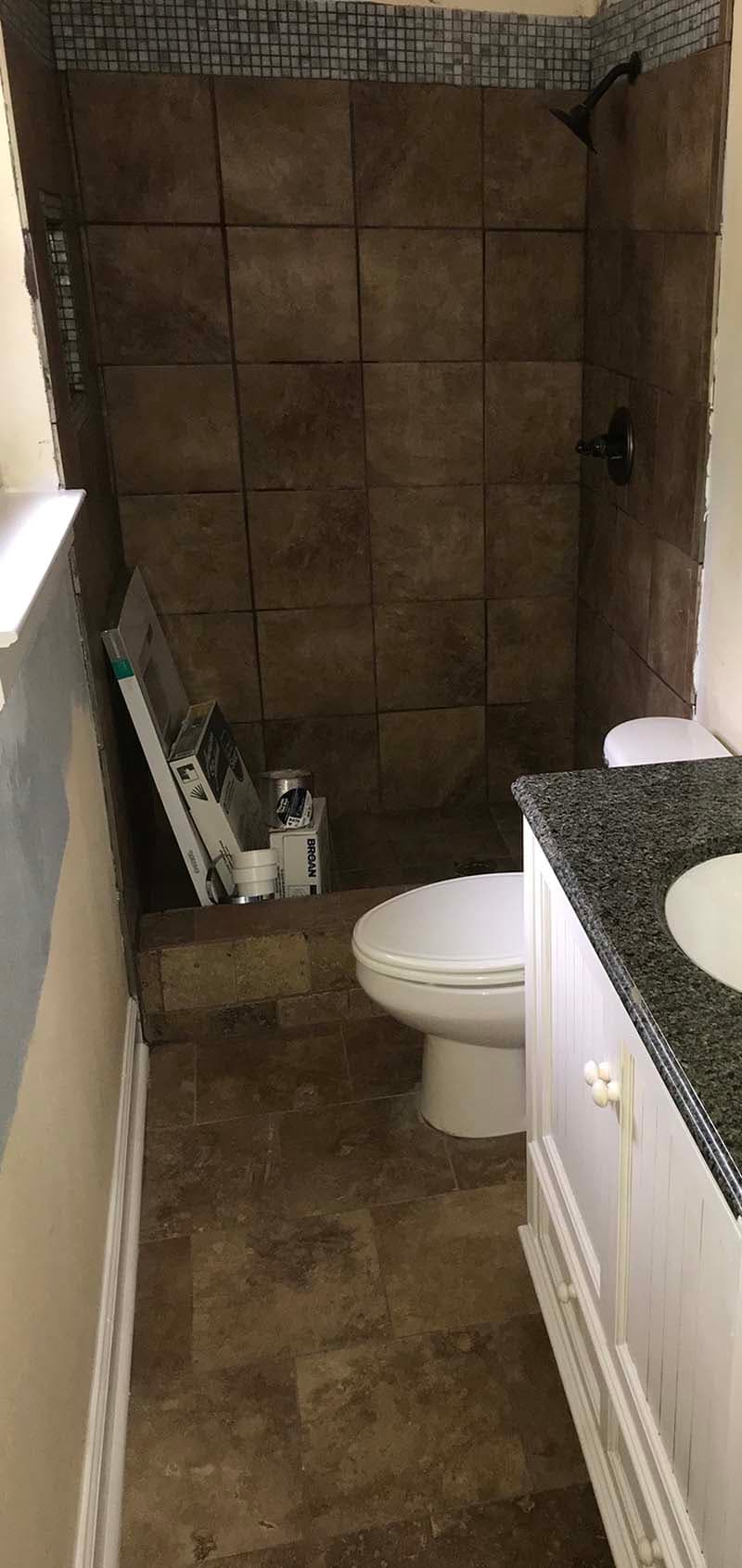 partially finished bathroom before a remodel by CorHome
