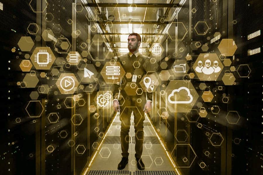 Man in Server Room with Austin IT service icons