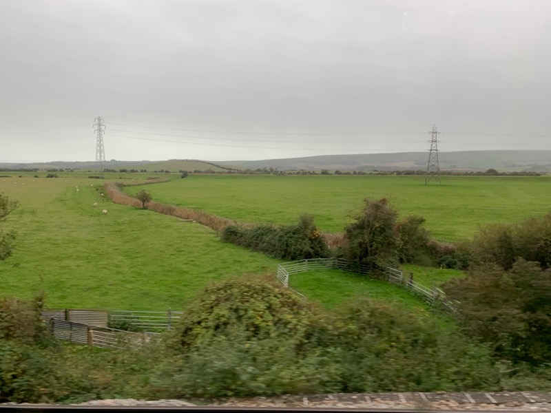 A view of fields seen from the train between Lewes and Newhaven.