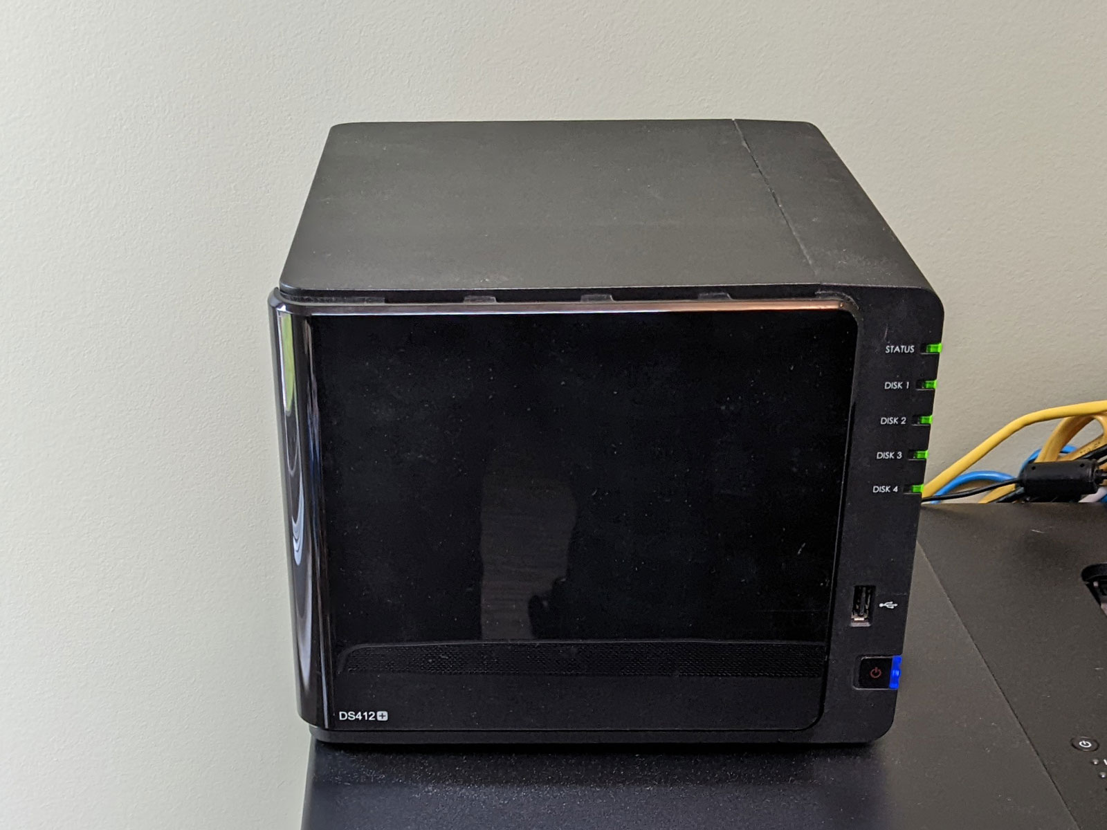 Photo of Synology DS412+ on my shelf