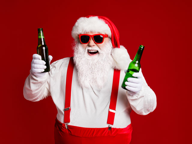Santa Claus double-fisting two bottles of beer while playing Christmas drinking games