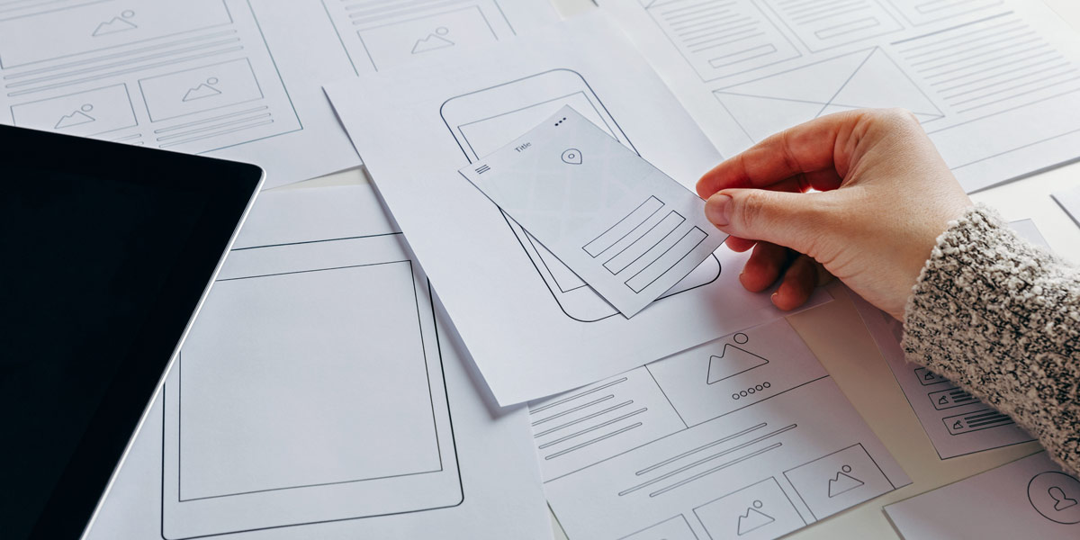 Low-fidelity wireframes created by a UX designer Some low-fidelity wireframes hand-drawn by a UX designer