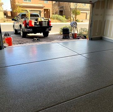 newly installed grey epoxy floof in a residential garage
