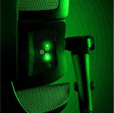 The back of an X-Chair with massage intensity setting lights on