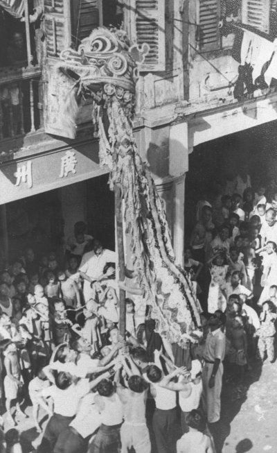Lion dance on Smith Street, Chinatown, 1951