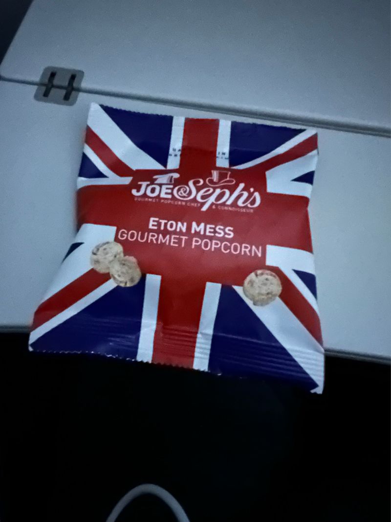 A small packet of Eton Mess popcorn. The design sports a union flag.