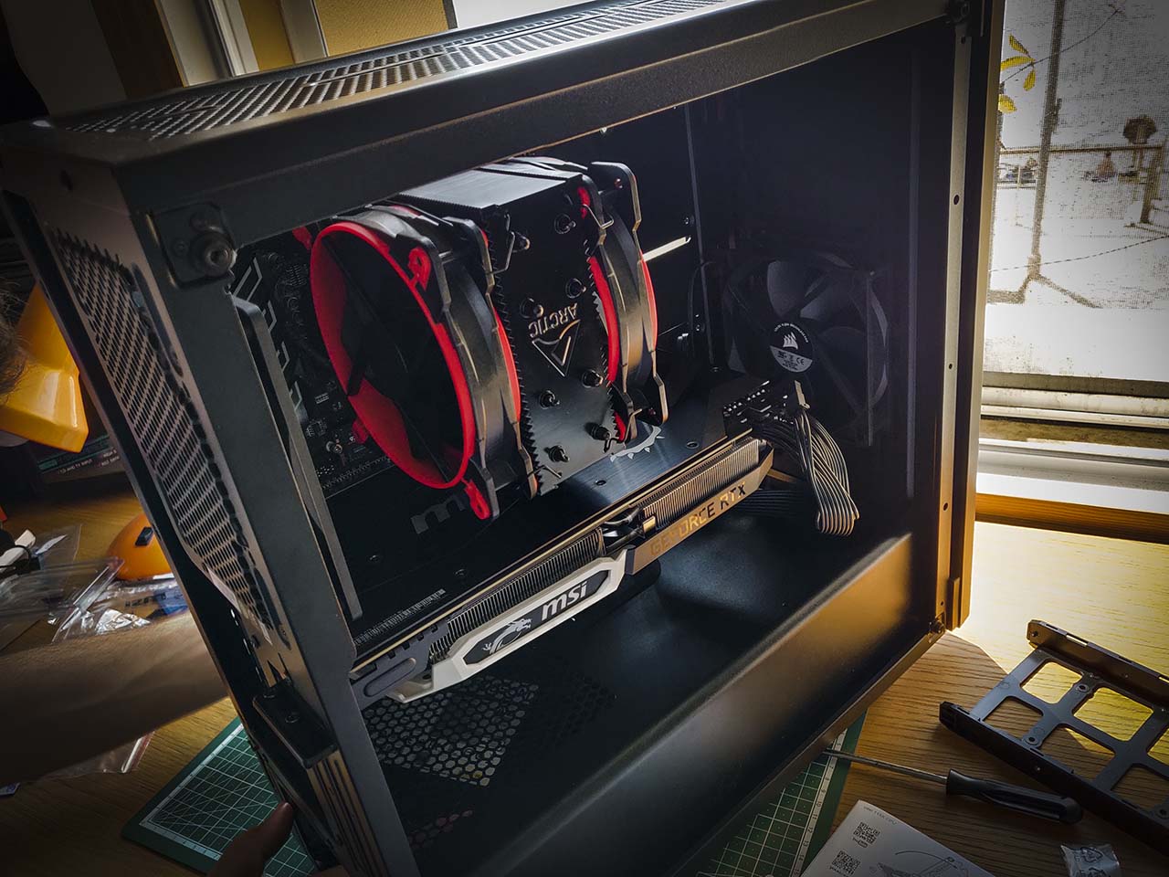 The CPU cooler and the graphic card in evidence on the left side of the case The CPU cooler and the graphic card in evidence on the left side of the case