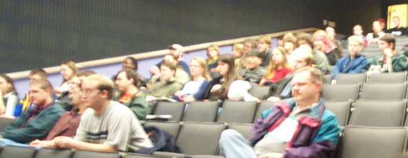 An early ANO meeting in the Bowen Thompson Student Union Theater. Many members are wearing colorful clothing.