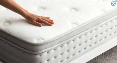 Noa Luxe, hand on mattress, certified foam