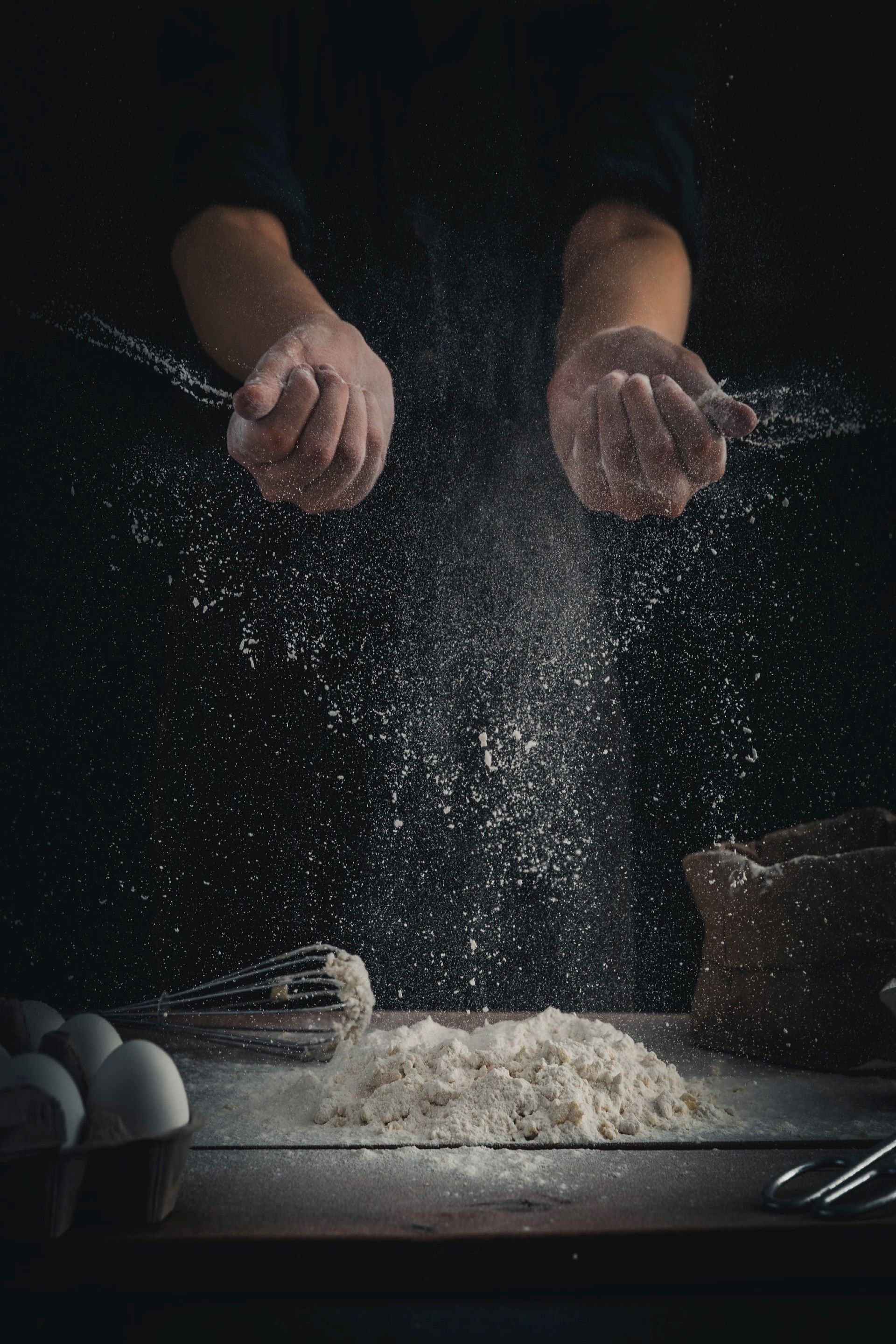 Chef tossing flour