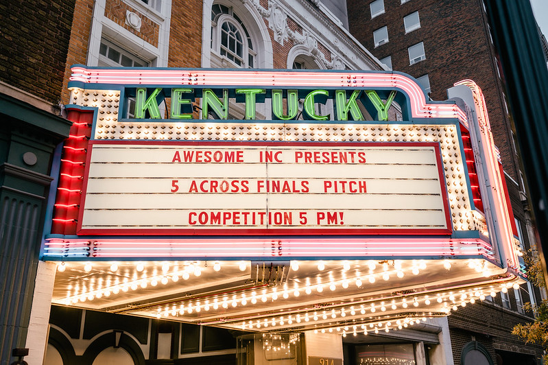 Movie theatre marquis sign that reads "Awesome Inc Presents 5 Across Finals Pitch Competition 5PM!"