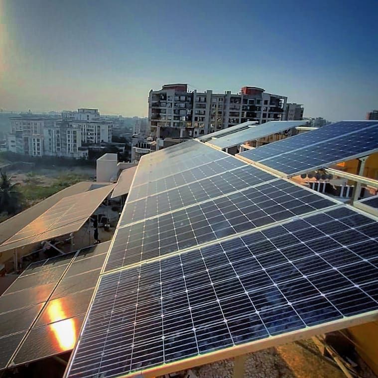 solar panels on terrace, skyline - Mumbai