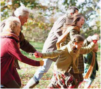 Senior citizens dancing outdoors