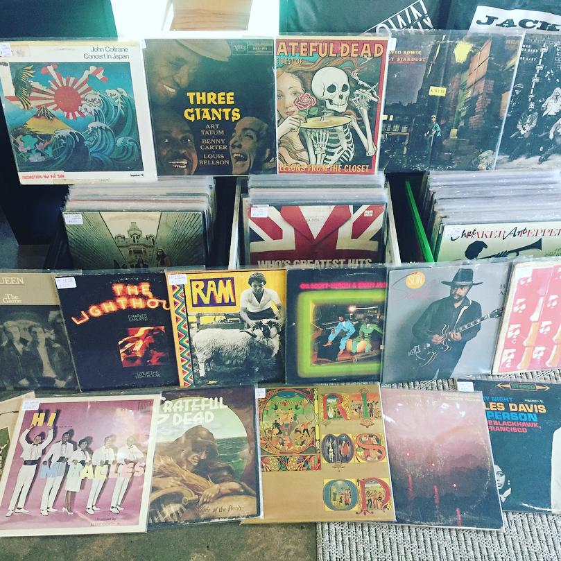 Record collection featuring jazz, rock, new wave, John Coltrane, Charles Earland, Gil Scottheron, Grateful Dead, The Who, King Crimson, & Miles Davis.