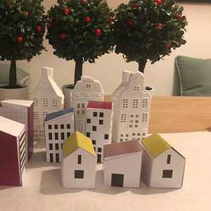 Season's Greetings from Neatline! Download these little houses, print and construct to create your own festive village. Link in profile #downloadables #paperhouses #christmas