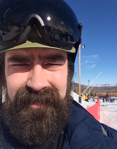 Selfie on a mountain in a ski helmet.