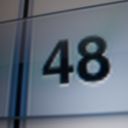 Kinda blurry macro pic of the number the forty eight on a computer screen. The are hints of “lickable” early OSX glassy styling.