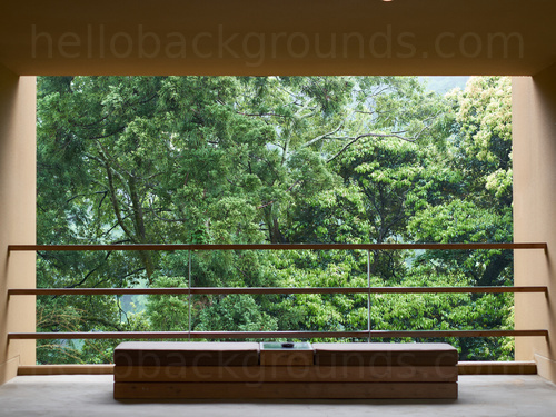 Cream coloured balcony with metal safety bars and bench holding views on to trees Google Meet background