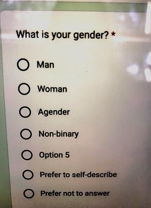A photo of a form with a "What is your gender?" question and radio options for "Man", "Woman", "Agender", "Non-binary", "Option 5", "Prefer to self-describe", and "Prefer not to answer"
