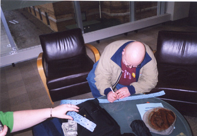 The Raffle at Animarathon III. Two guests are signing their tickets