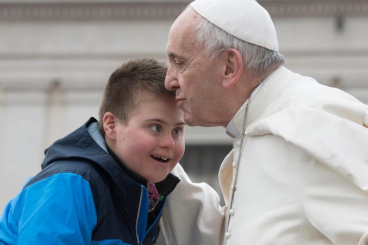 Image of the pope embracing a Downie