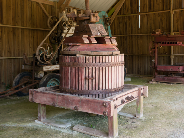 An old fashioned wooden cider press