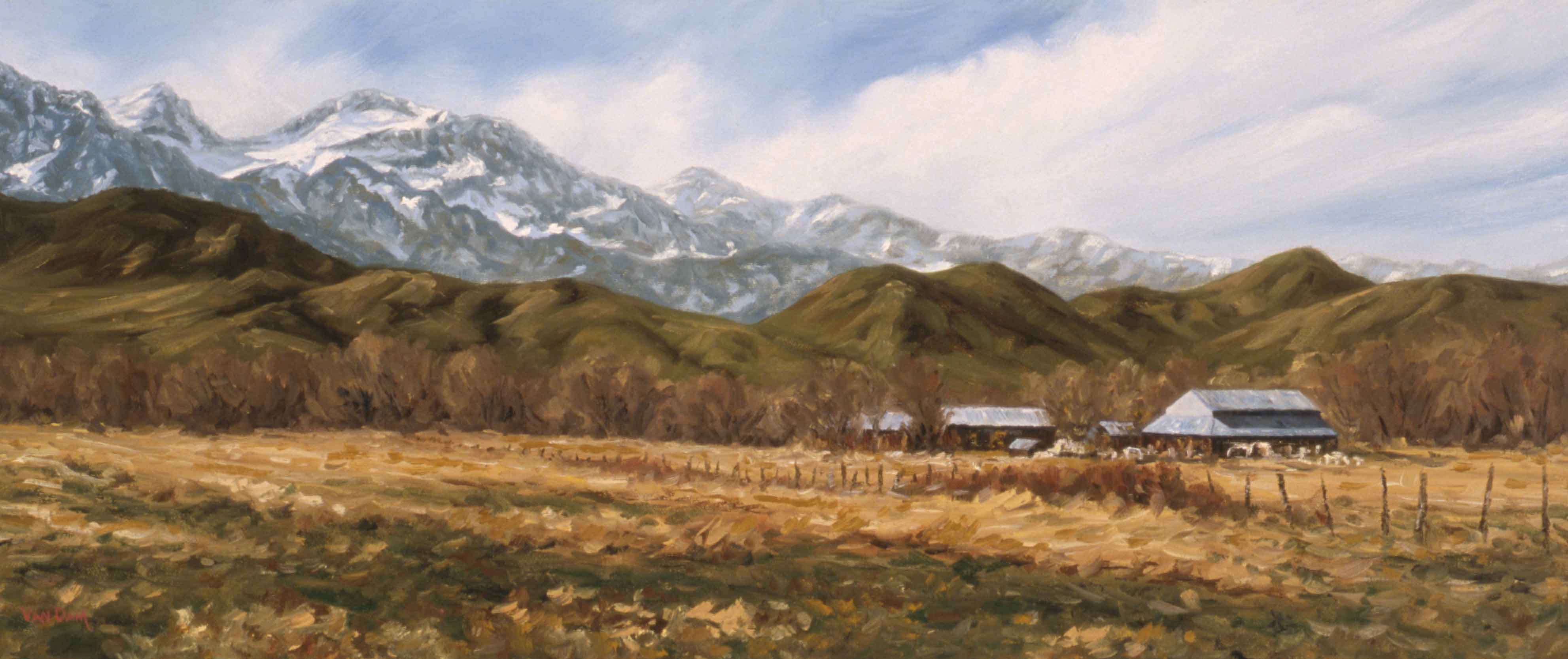 Ranch in fron of Snow Capped Mountains